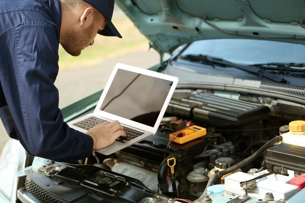 Mechanic Checking the Engine | Auto Body Repair in Sioux Falls