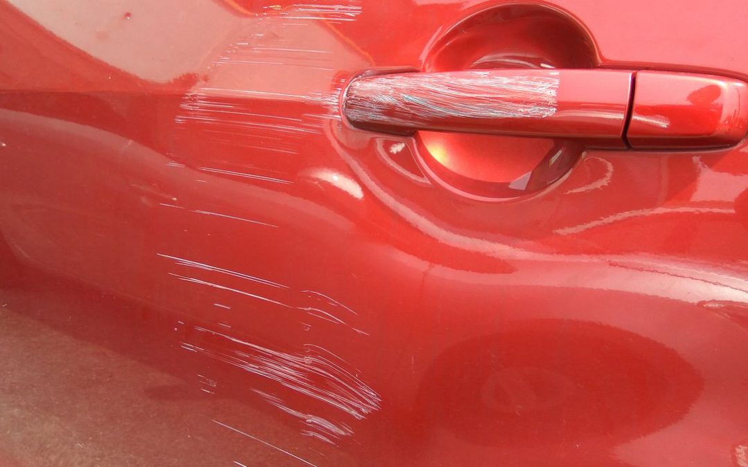 Red car with scratches | Car Scratch Repair
